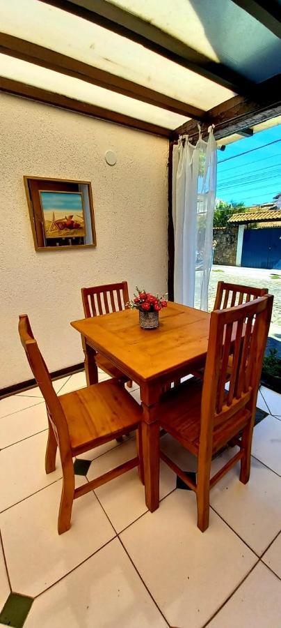 Bliss Hoteis Centro Búzios Zewnętrze zdjęcie A dining room table with four chairs
