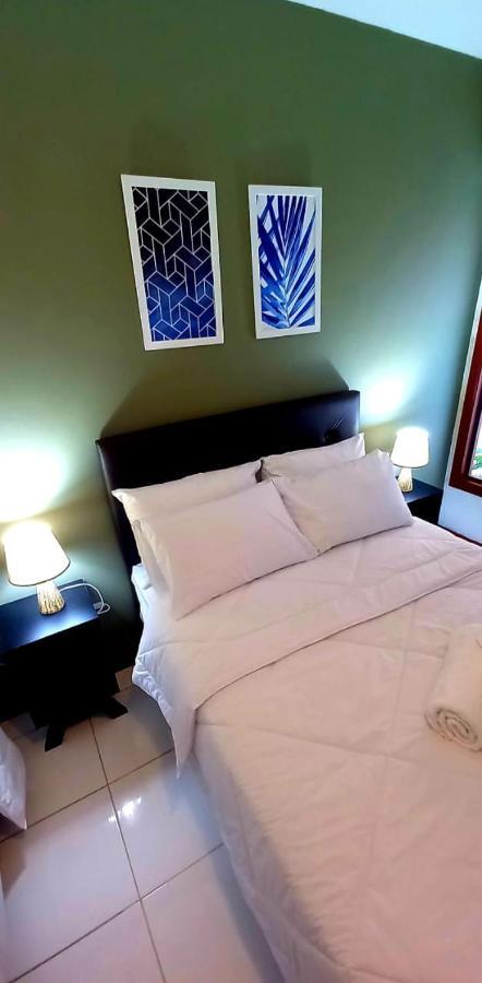 Bliss Hoteis Centro Búzios Zewnętrze zdjęcie A bed with two pillows