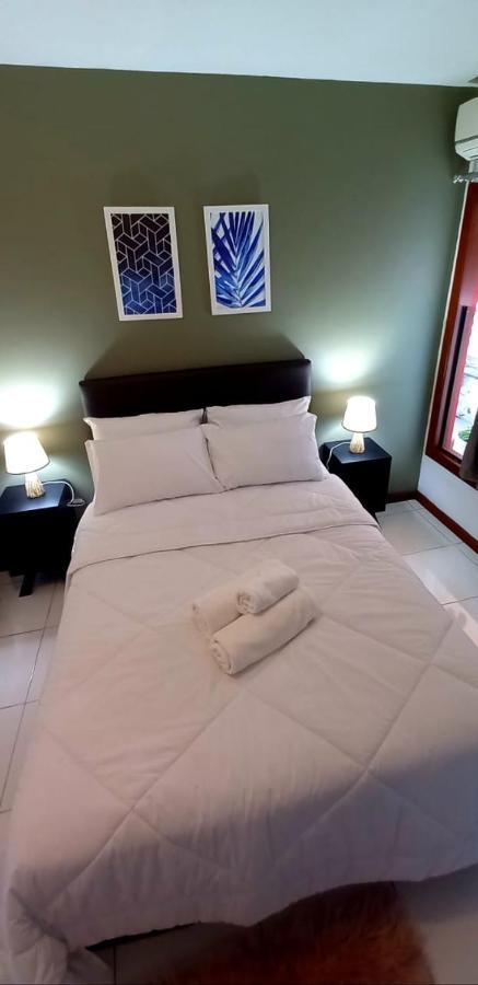 Bliss Hoteis Centro Búzios Zewnętrze zdjęcie A bed with a duvet